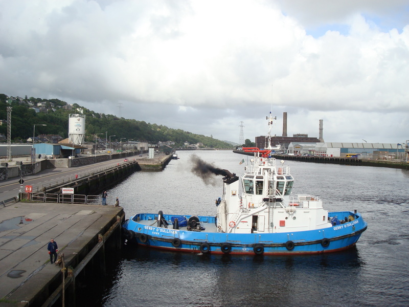 A tug farewells us