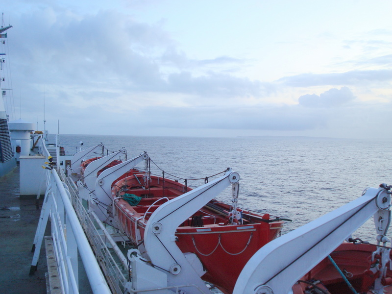 Life-boats from deck 9 as we savour our last sight of land